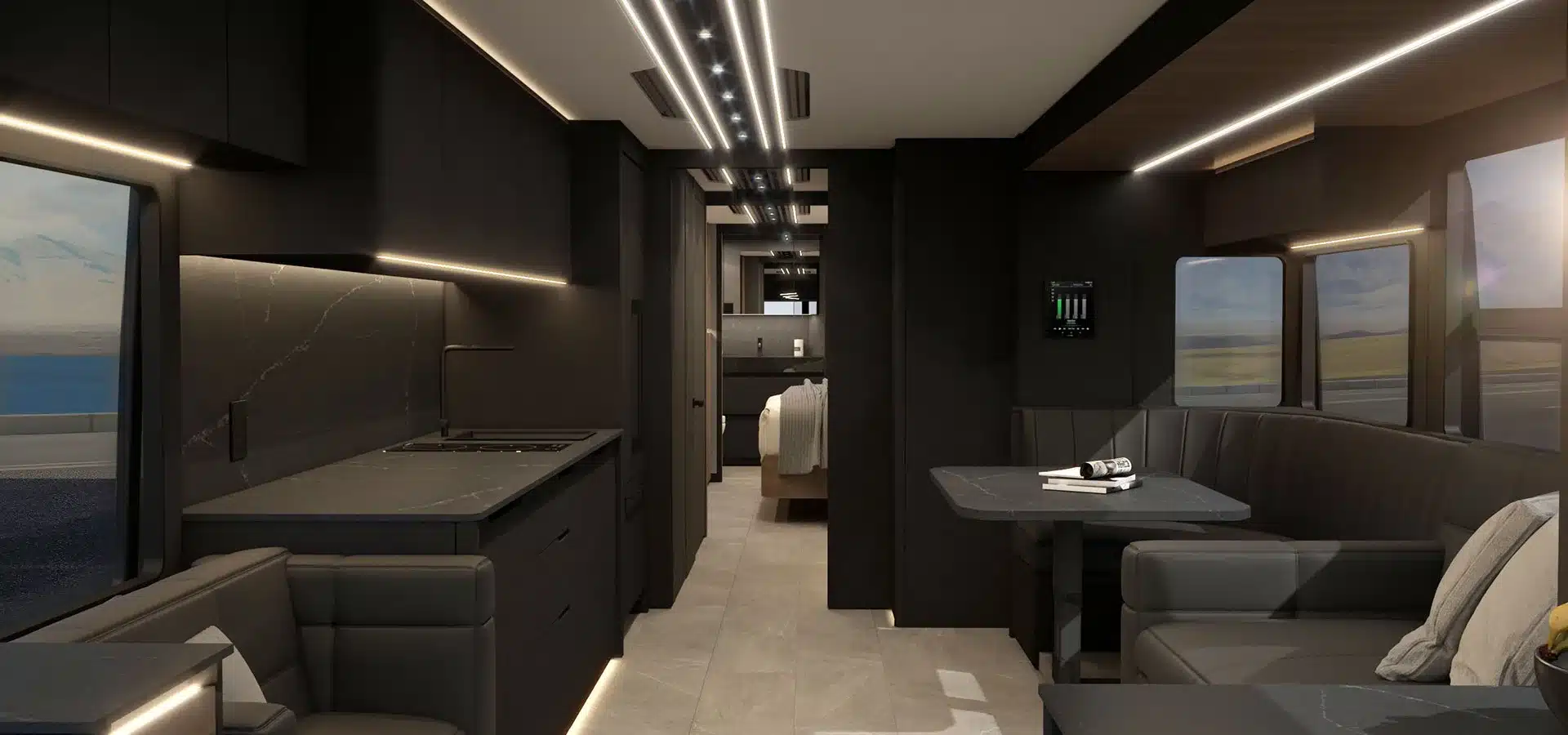 Innenansicht des Elite H-Series Motorhomes mit moderner Küche, Sitzbereich und Blick ins Schlafzimmer