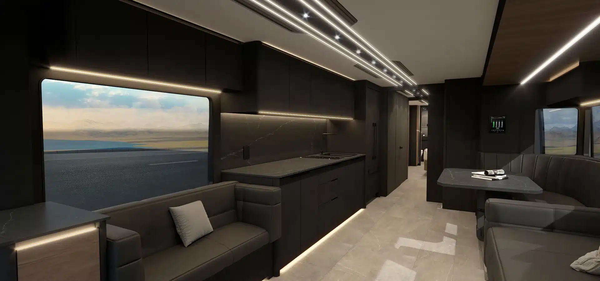 Innenansicht des Elite H-Series Motorhomes mit moderner Küche, Sitzbereich und großen Fenstern