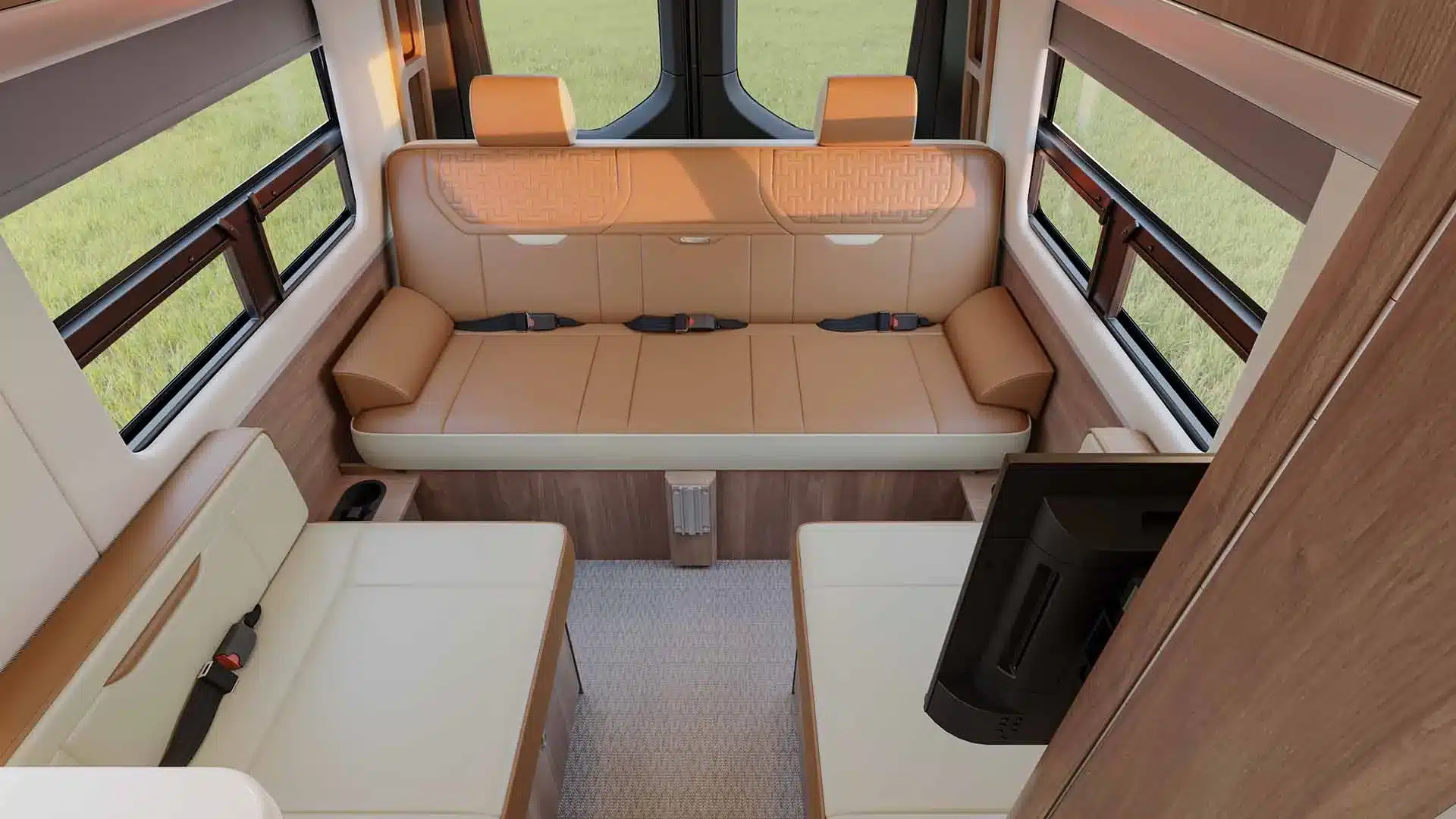 Luxuriöser Sitzbereich mit Lederpolstern im Innenraum des Airstream Interstate 24GT Reisemobil.