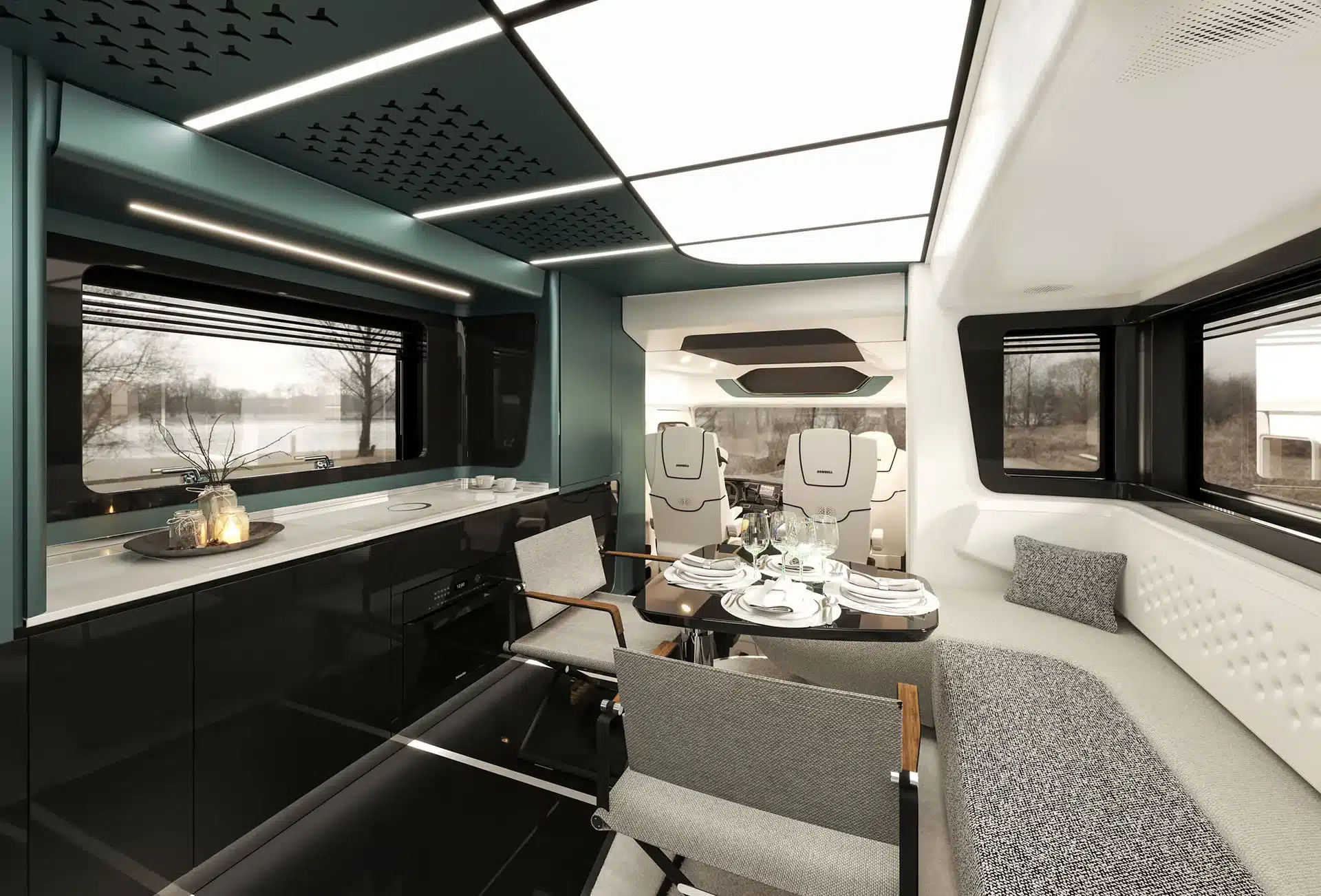 Der hochwertige und moderne Innenraum des Dembell Elite Reisemobils mit Essbereich, Küche und großer Fensterfront.