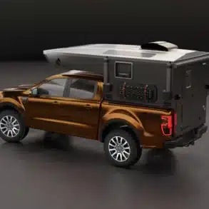 Aquila S Slide-In Reisekabine montiert auf braunem Ford Ranger Pick-up in Studioansicht