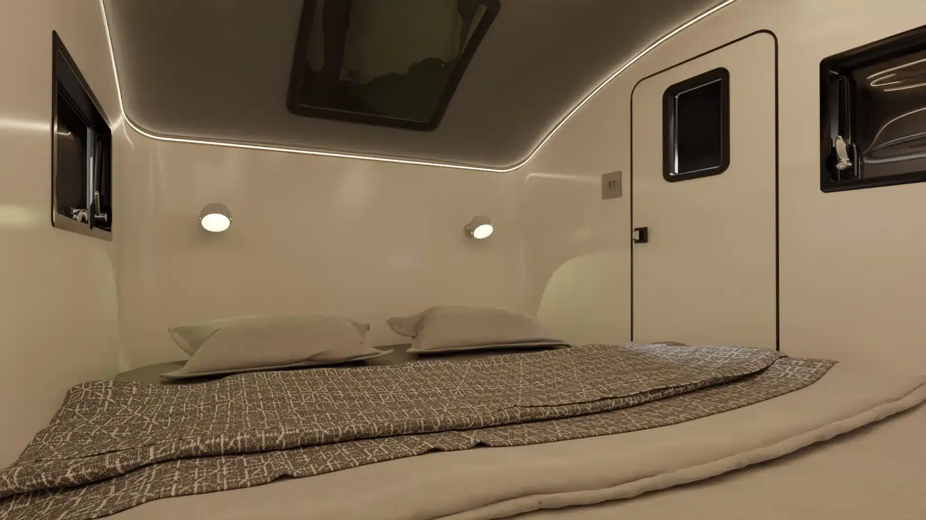 Blick in den Schlafbereich des Vulpes S Micro-Campers mit Fenster, Tür und integriertem LED-Licht