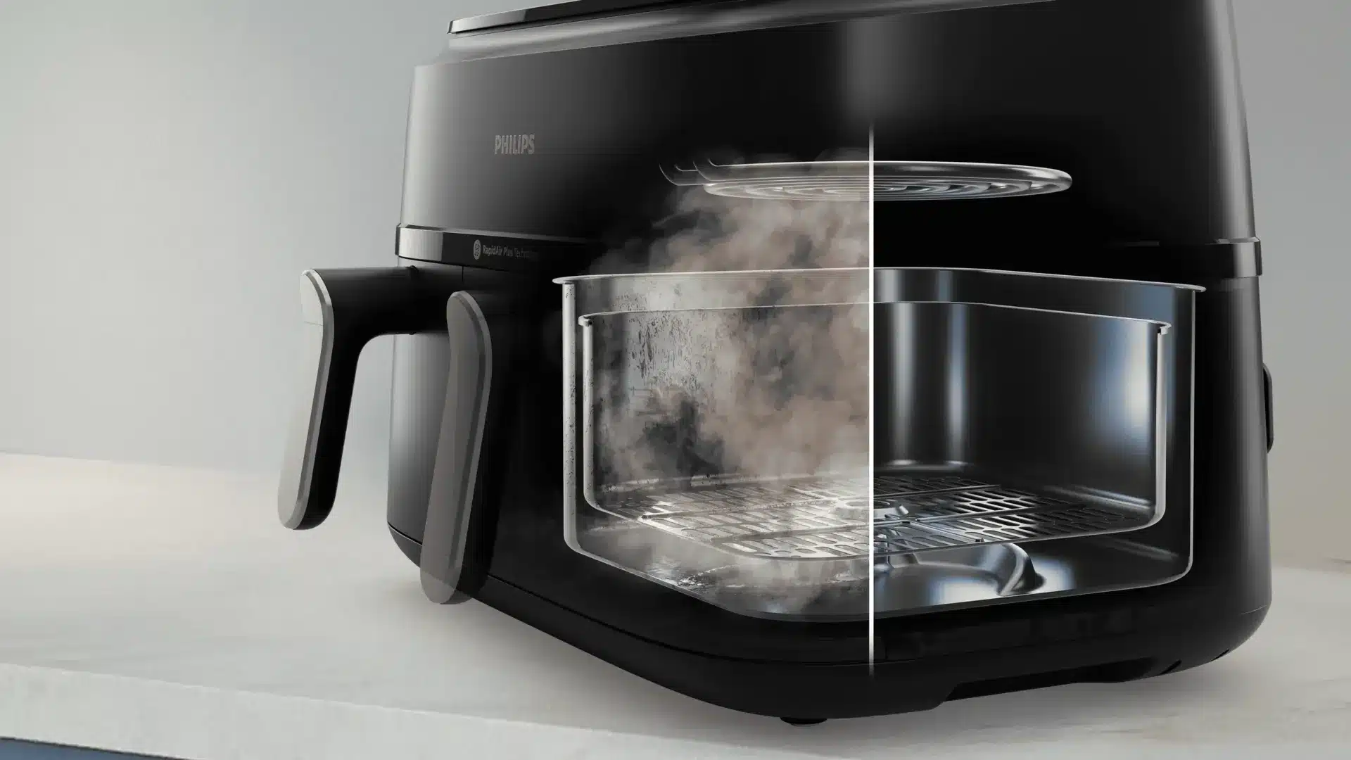 Philips Airfryer mit geteilter Darstellung: links während des Betriebs mit Dampfentwicklung, rechts gereinigtes Innenleben.