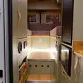 Innenraum eines individuell gestalteten Campers von Crozier Campers mit funktionalem Ausbau und Beleuchtung