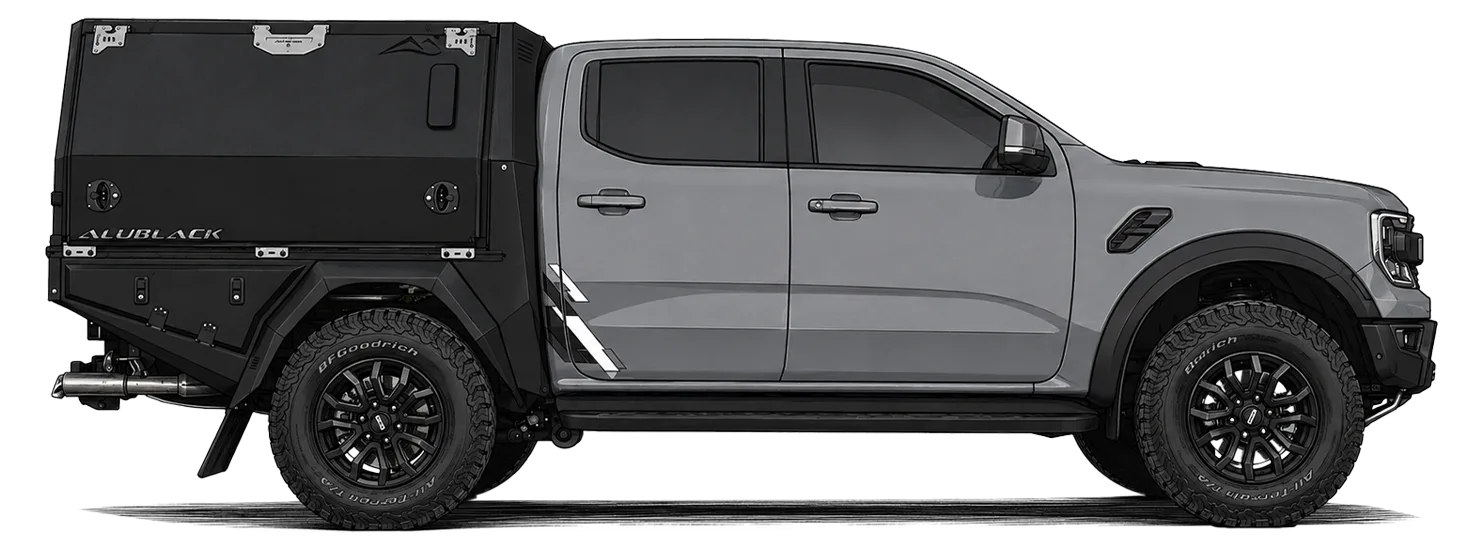 Grauer Toyota Tacoma mit schwarzem AluBlack Flatbed und geschlossenem Canopy