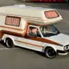 Weißer Volkswagen Caddy Bischofberger Family Hochdach von 1992 mit Streifendekor und ATS-Rädern