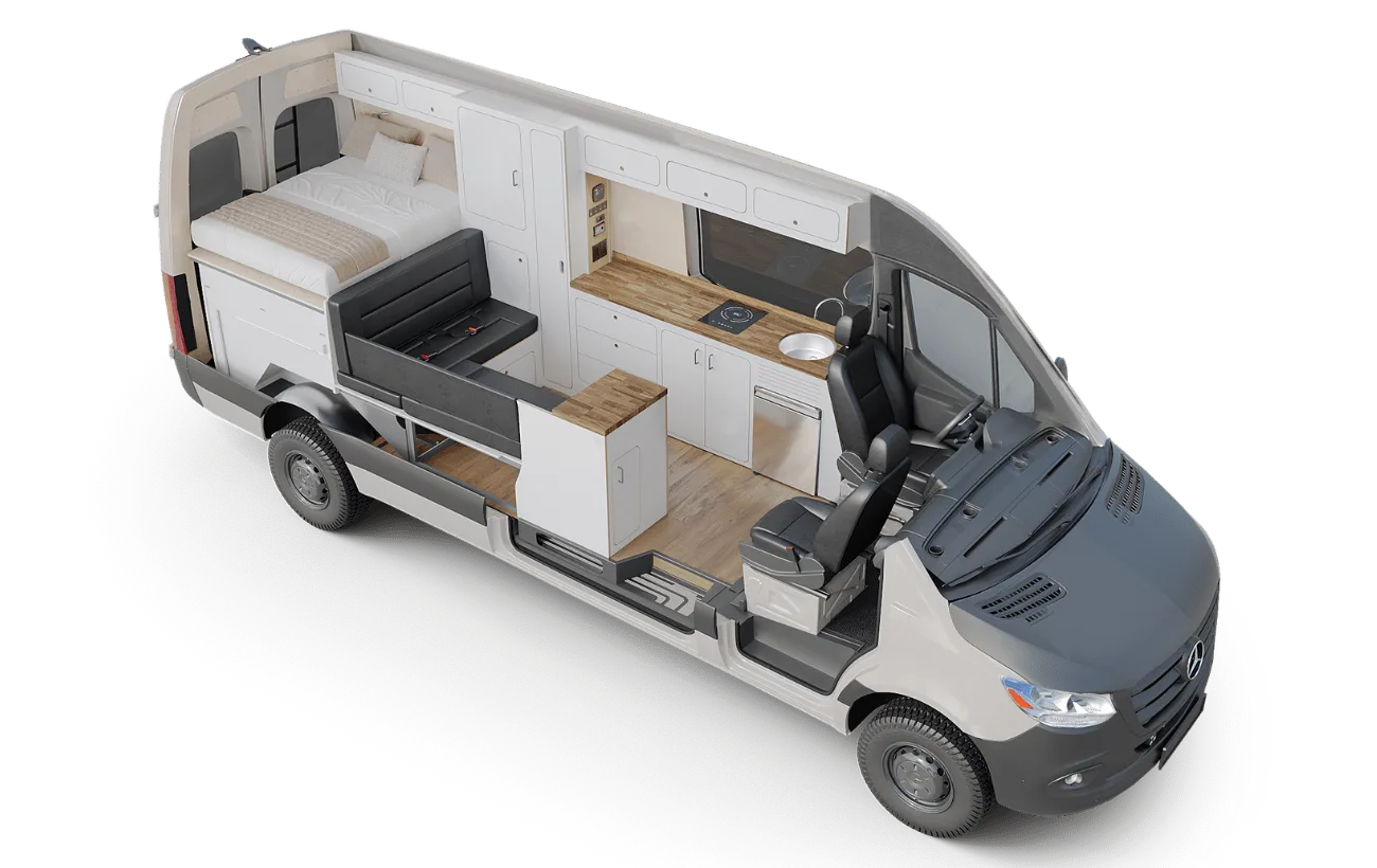 Innenansicht des VanCraft Waypoint XL mit Bett, Küche, Sitzbank und Fahrerhaus